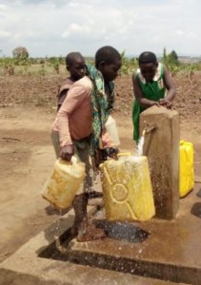 Refugees collecting drinking water Nakivale refugee settlement